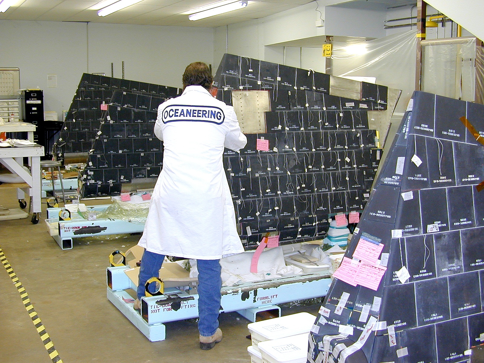 Dscn0842 Engineer assembling thermal protection ceramic tiles in manufacturing facility