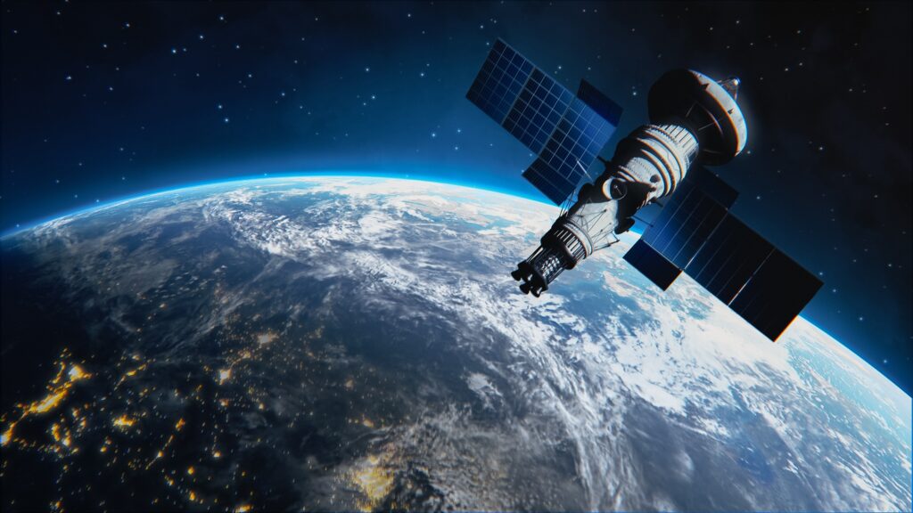 Satellite flying by Planet Earth as seen from space