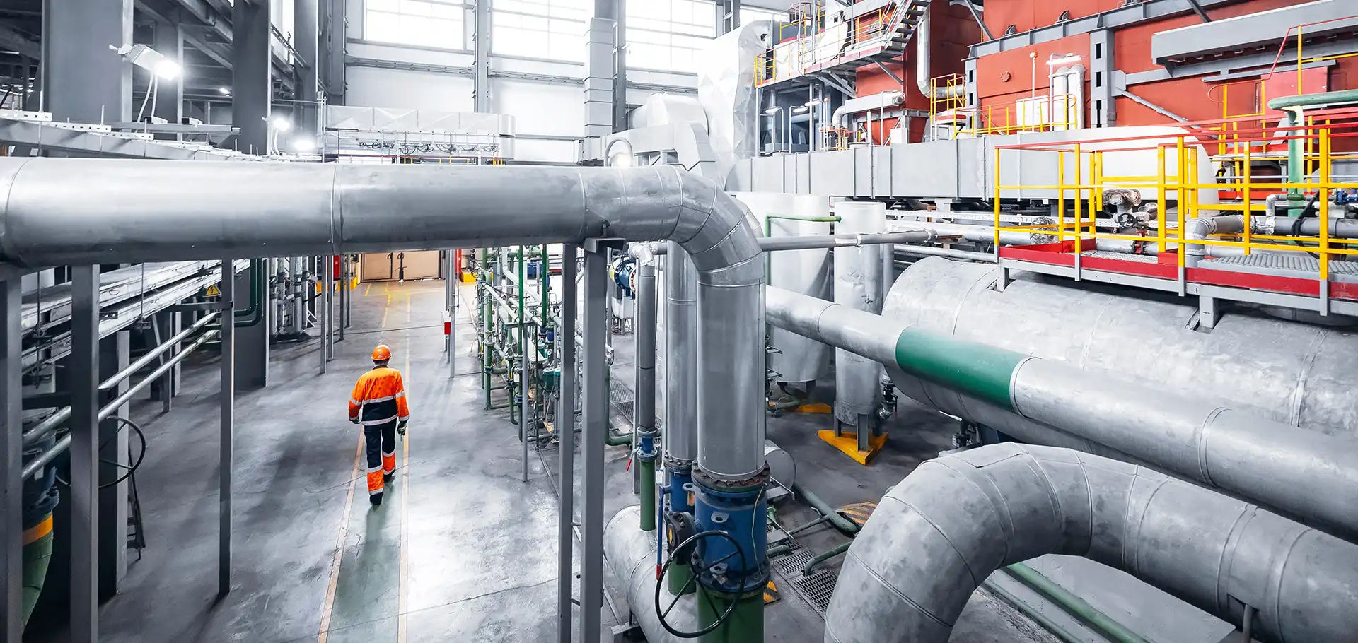 Industrial Worker inspection at steel long pipes and pipe elbow in thermal power plant, refinery valve of visual check record.