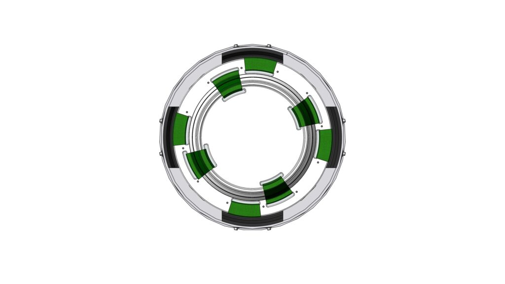 Bottom view of a wellhead cleaning tool showing internal cleaning pads arranged around the inner ring.