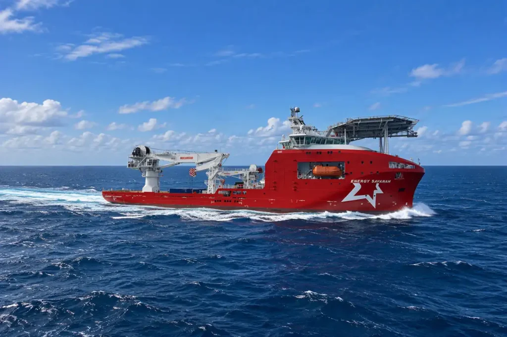 EnergySavanahImageNew01copy | Oceaneering The Multi Service vessel Energy Savannah sailing at sea viewed from above with a helicopter landing deck and heavy lift crane visible on deck