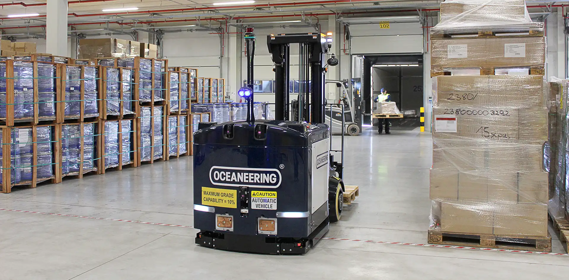 MaxMover™ autonomous pallet handling system improving warehouse throughput and dock capacity within a manufacturing and distribution facility