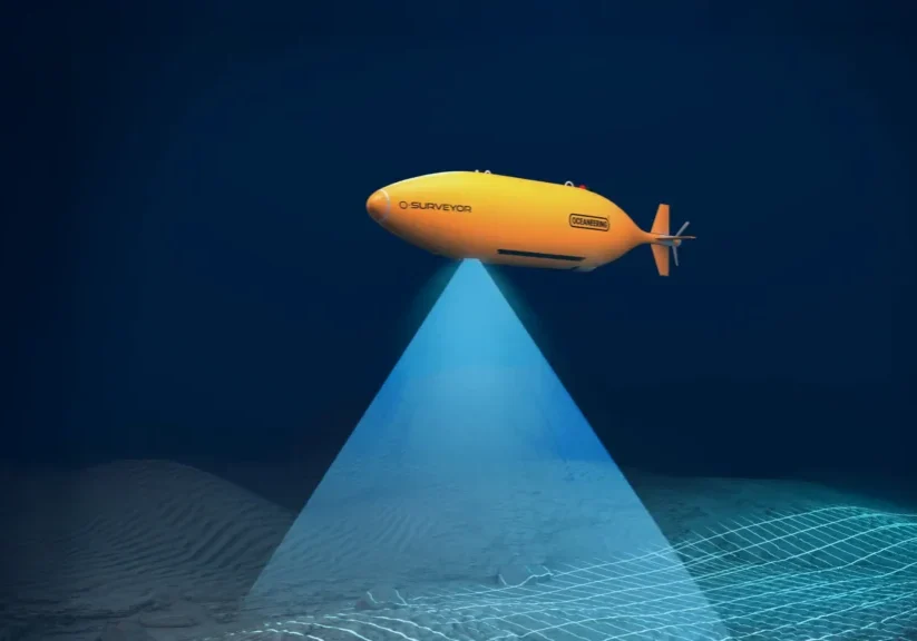 Oceaneering O-Surveyor autonomous underwater vehicle conducting seabed survey operations.