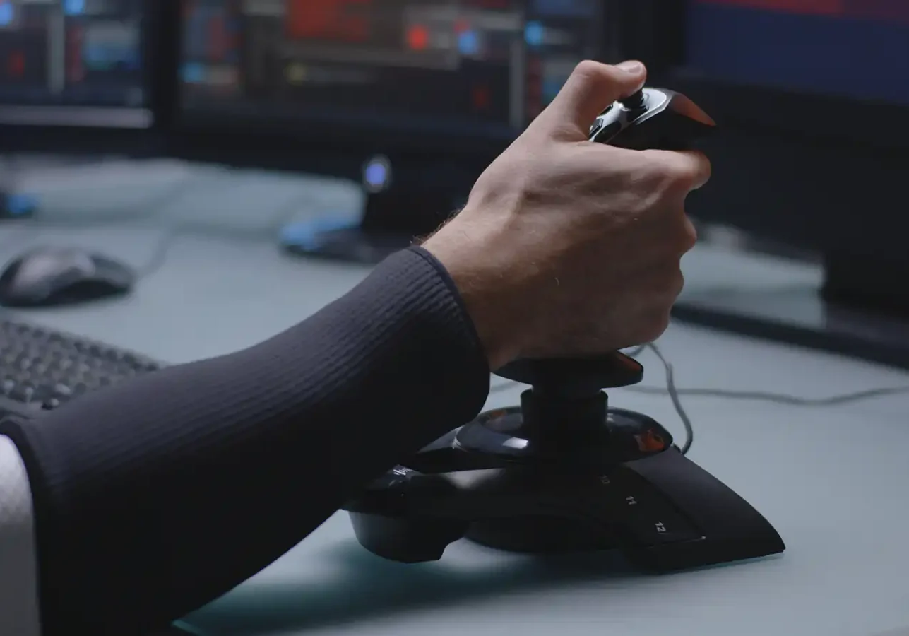 Close up of a man using a remote controller